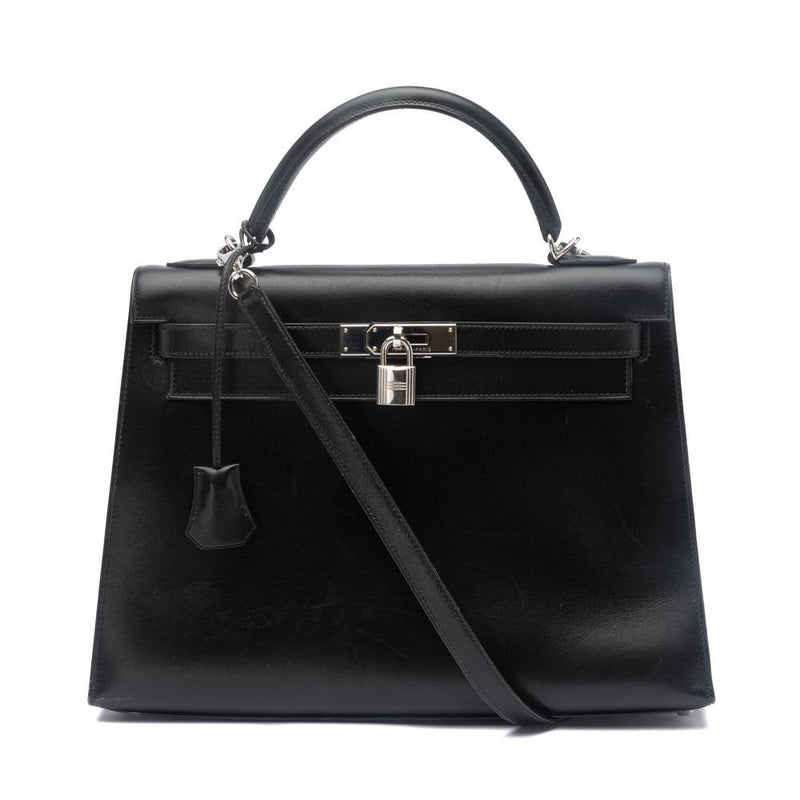 Lot - Hermés Black Box Leather Kelly Retourne 32 Handbag, Date